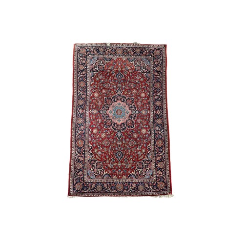 167 - A pair of Persian carpets, in blues and redsDimensions:84 in. (L) x 51 in. (W)... 