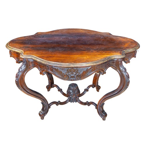 133 - IrishEarly 19th CenturyA rosewood centre table Provenance: Eddie IrvineDimensions:31 in. (H) x 51 in... 