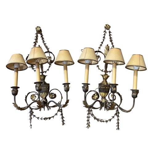 487 - Continental20th CenturyA chandelier and a pair of wall lights with foliate designTo be sold without ... 