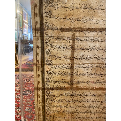 513 - Persian (?)17th century (?)An illuminated scroll, with gold leaf Dimensions:62.5 in. (H) x 24 in. (W... 