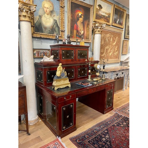 146 - Russianc.1820-40A brass mounted mahogany and ebony desk, with decorative inlaid wood panels with gil... 