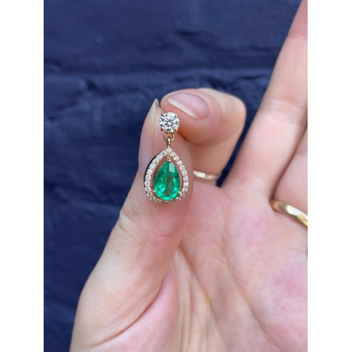 13 - EuropeanContemporaryAn attractive pair of Columbian emerald and diamond pendant earringsEach pear sh... 