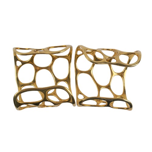 12 - GavelloMilanContemporaryA pair of 18 carat gold and diamond cuff banglesOf molecular design, the mol... 