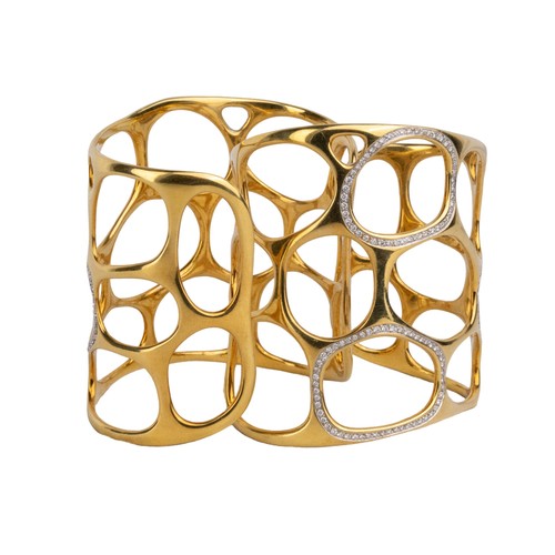 12 - GavelloMilanContemporaryA pair of 18 carat gold and diamond cuff banglesOf molecular design, the mol... 