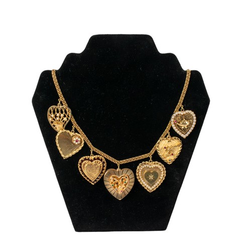 50 - ItalianCirca 1960sA most unusual multi heart necklace on a fancy link chainThe hearts set with pearl... 