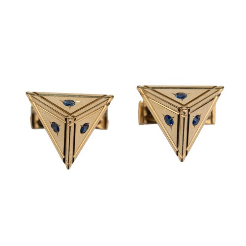 65 - ContinentalCirca 1950A pair of sapphire and yellow metal pyramid cufflinksStamped '14K'Weight: Appro... 