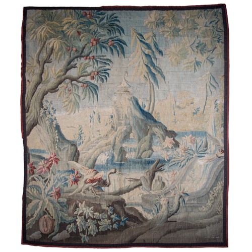 291 - FrenchEarly 18th CenturyA large verdure chinoiserie Aubusson tapestryWith an exotic bird in a river ... 