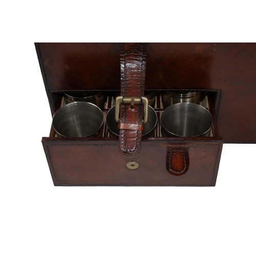 660 - British20th CenturyA brown leather shooting drinks caseIncludes wine cooler, cups and leather handle... 