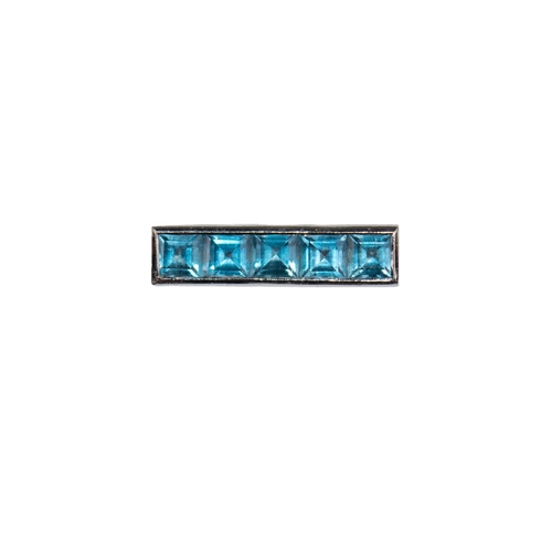 22 - Theo FennellCirca 2000A blue topaz 18 carat white gold strip ringRing size: L 1/2Weight: Approx. 9.2... 