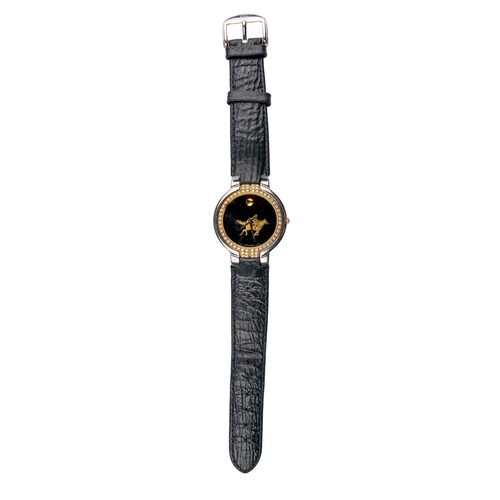 24 - SwissCirca 2000A diamond set polo playing lady's wristwatchWith black dial and gold polo player deco... 