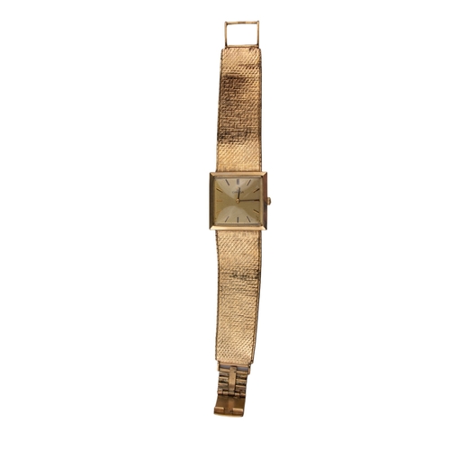 27 - OmegaCirca 1970A 9 carat gold gentleman's wristwatchWith square dial, on a flexible textured link in... 