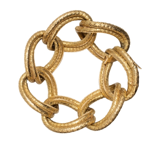 41 - HermèsParisCirca 1950An elegant French 18 carat gold oval curb link twisted wire work bracele... 