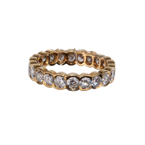 42 - Van Cleef and ArpelsParisCirca 1967An 18 carat gold and brilliant cut diamond hoop ringNumbered 8868... 