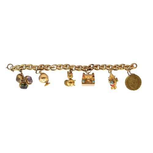 48 - ContinentalCirca 1930An 18 carat gold fancy curbed link charm braceletWith six charms, including a 1... 