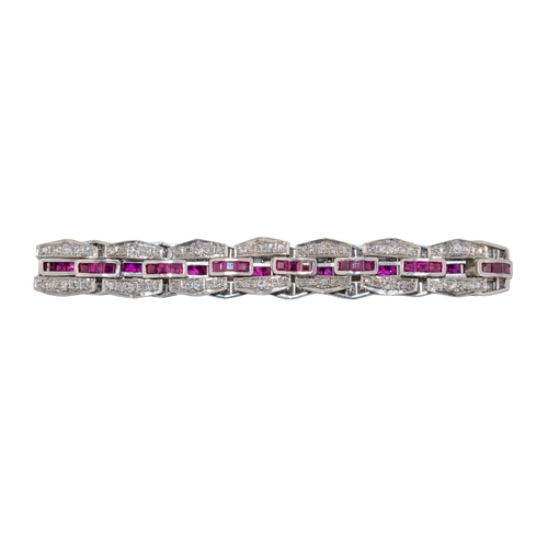 8 - EuropeanCirca 1940A diamond, ruby and platinum sectional bracelet The hexagonal sections set with di... 