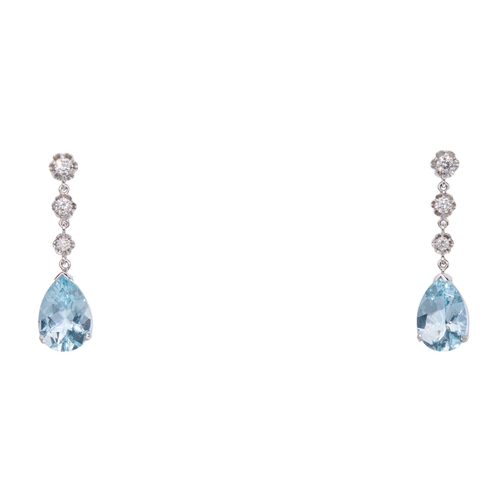 9 - ContinentalCirca 1980A pair of aquamarine and diamond pendant earringsThe pear shaped mixed cut aqua... 