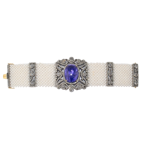 101 - ContinentalContemporaryA Belle Epoque style tanzanite, diamond and cultured pearl braceletThe centra... 