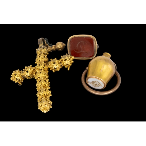 66 - BritishAntiqueA group of three yellow metal fob pendants[a] A cannetille style crucifix pendant[b] R... 