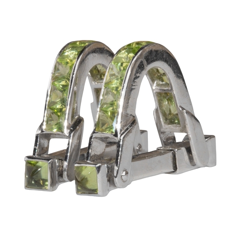 67 - ContinentalCirca 2000A pair of peridot and white gold stirrup cufflinksWith cabochon peridot termina... 