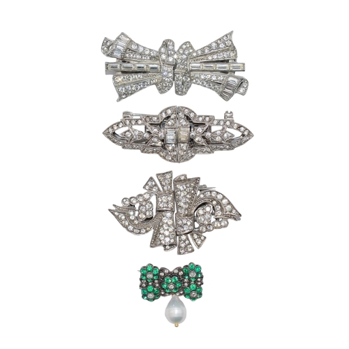 90 - Art DecoCirca 1940A group of silver and paste broochesA silver and paste double clip broochTogether ... 