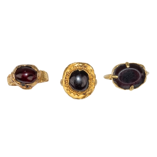 113 - AncientThree various ancient gold and garnet dress ringsWeight: Approx. 12.89 grams (total)... 