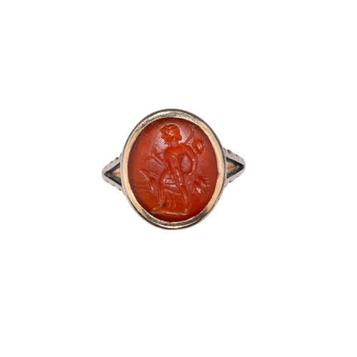 115 - Ancient Roman, 2nd-3rd Century ADA carnelian intaglio and yellow gold ringThe intaglio engraved with... 