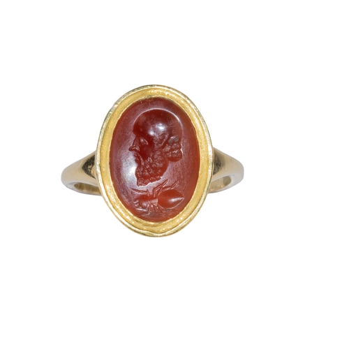 116 - Ancient Roman2nd-3rd Century ADA carnelian intaglio and yellow gold ringThe intaglio carved with the... 