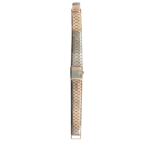 128 - AccuristBritishCirca 1970A 9 carat gold bark finished lady's bracelet wristwatchWeight: Approx. 39.1... 