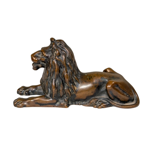 296 - French19th CenturyAntoine-Louis Barye (1795-1875)A recumbent bronze lionDimensions:4.5 in. (H) x 3 i... 