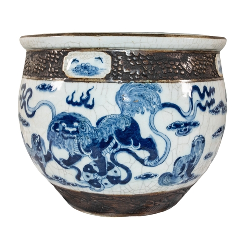 638 - ChineseA blue and white crackle glazed jardinièreDecorated with Chinese dragons between bronz... 