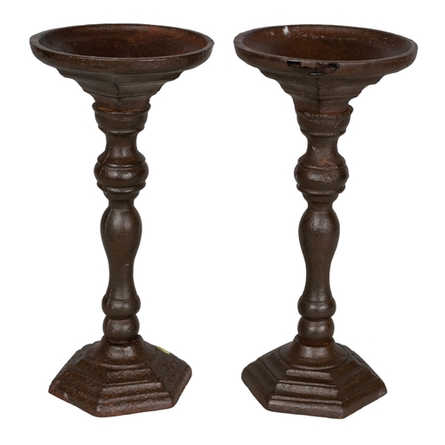 668 - 20th CenturyA pair of wrought iron candlesticksDimensions:10 in. (H)... 