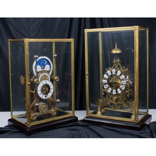 670A - In the manner of Sinclair Harding20th centurySkeleton clock with moon phaseThe Roman numeral hours c... 