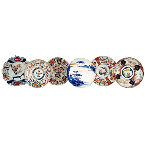 685 - Japanese19th Century and earlierA collection of twelve Imari plates, including several pairs and som... 