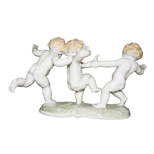 697 - Two German porcelain groupsEarly 20th centuryPrinted marksOne with a young couple holding sheet musi... 