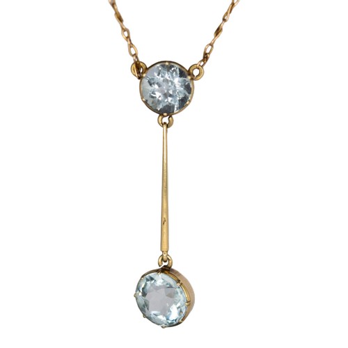 85 - BritishCirca 1920-30A 15 carat gold and aquamarine pendantDesigned as two brilliant cut aquamarines,... 