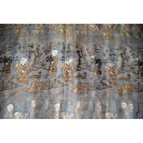 631A - Chinese18th centuryA pair of blue silk wall hangings depicting boys in an oriental setting Dimension... 