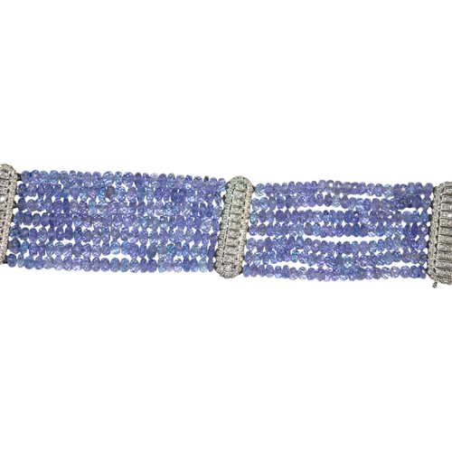 33 - ContinentalCirca 1990An attractive sapphire bead and diamond braceletThe bracelet composed of 7 rows... 