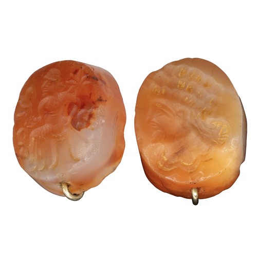 63 - Romano-SasanianAncientProbably 5th CenturyTwo carnelian intaglio cufflinks with 9 carat gold threads... 