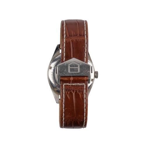 127A - Tag HeuerA stainless steel Carrera Twin-Time automatic wristwatch. With white dial with baton hour m... 