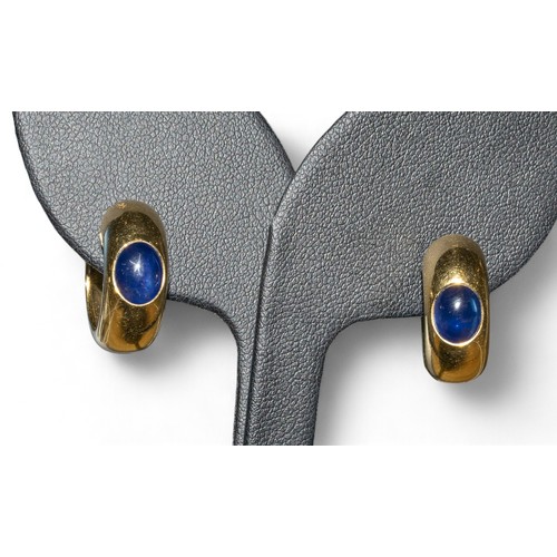 124A - ContemporaryA pair of 18 carat gold and cabochon sapphire hoop earringsThe hoops each set to the fro... 