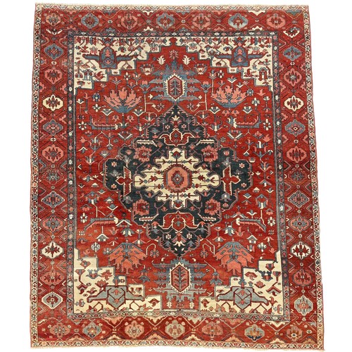 135 - 19th Century, PersianA Serapi carpet in reds and bluesDimensions:145 in. (H) x 122 in. (W)... 