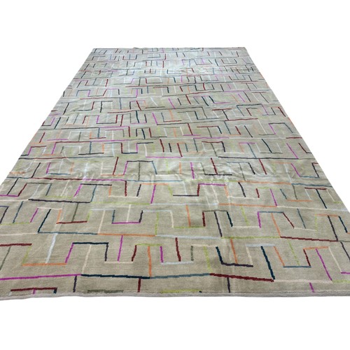 139 - Robert StephensonA grey carpet with colourful geometric designDimensions:177 in. (H) x 113 in. (W)... 