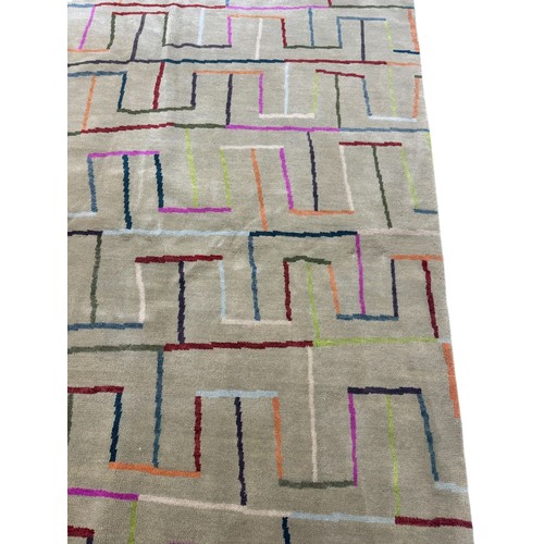 139 - Robert StephensonA grey carpet with colourful geometric designDimensions:177 in. (H) x 113 in. (W)... 