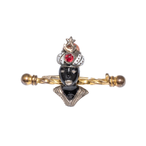 10 - ContinentalCirca 1920A gold, silver, enamel and gem set Blackamoor bar pinWeight: Approx. 5.78 grams... 