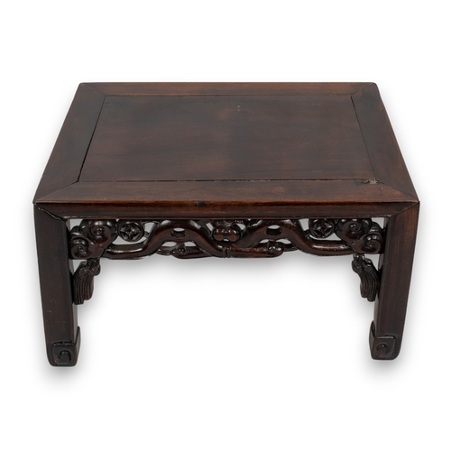 108 - Chinese, 19th century or earlierA fine hardwood stoolWith oriental frieze running underside of table... 