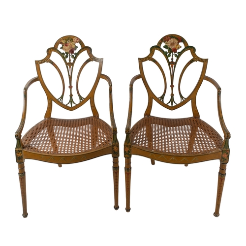 109 - George IIIA pair of painted shield back chairs, with caned seats raised on turned legsDimensiosn:37.... 