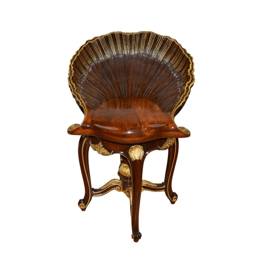 126 - French, Circa 1890sA hardwood parcel gilt piano stool with an oversized shell motif swivel seat, wit... 