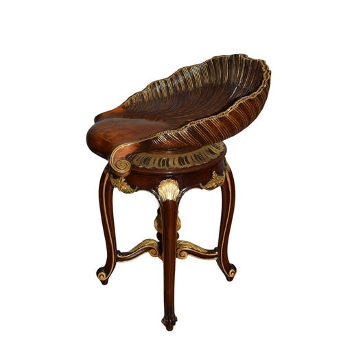 126 - French, Circa 1890sA hardwood parcel gilt piano stool with an oversized shell motif swivel seat, wit... 