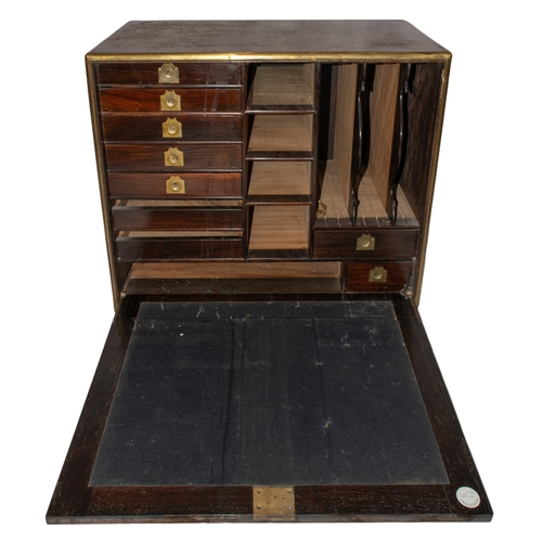 128 - BritishCirca 1820A rosewood brass-mounted portable campaign office, with fitted carrying handles. Th... 