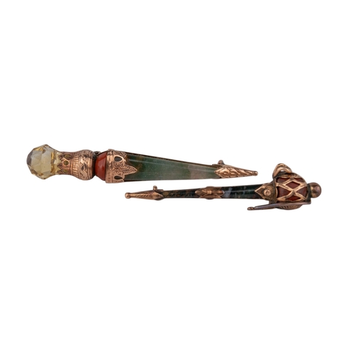 14 - ScottishCirca 1880Two dirk broochesBoth mounted in yellow gold and set with moss agate, jasper and c... 